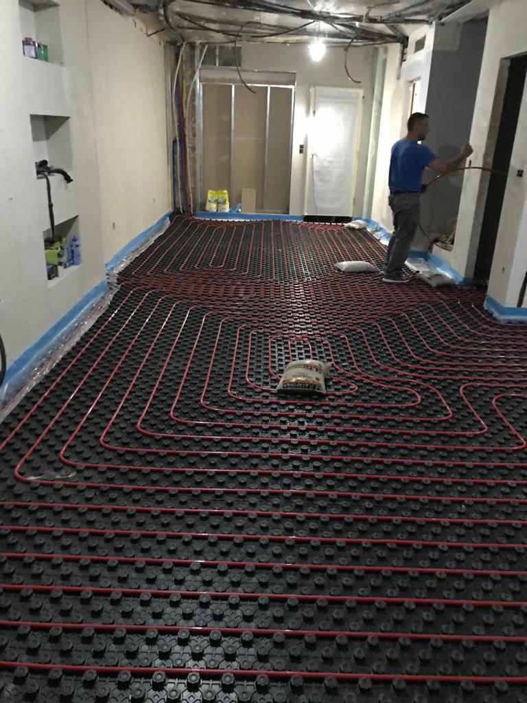 Reforma de vivienda completa y suelo radiante